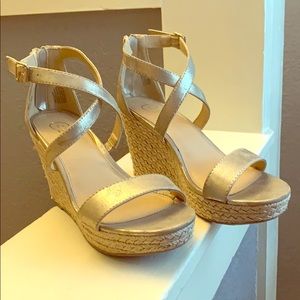 Gold, strappy wedge with zipper back